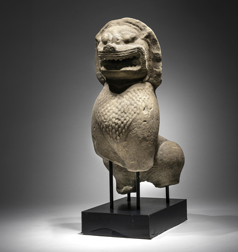 <b>A SANDSTONE FIGURE OF A GUARDIAN LION</b>
