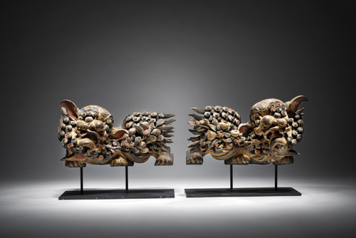 <b>A PAIR OF POLYCHROME WOOD ARCHITECTURAL ORNAMENTS</b>