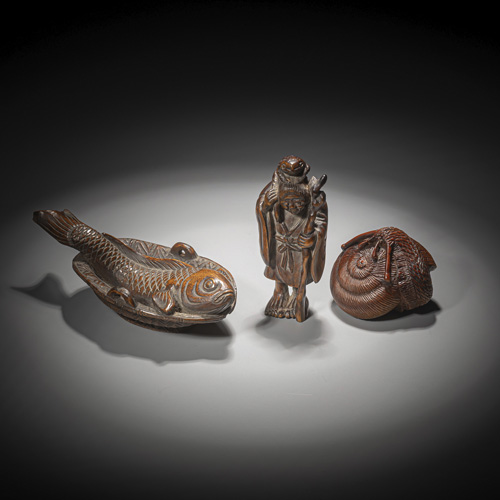 <b>Three carved wood netsuke</b>