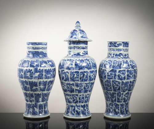 <b>Three blue and white porcelain vases covered with cartouches depicting various landscapes</b>