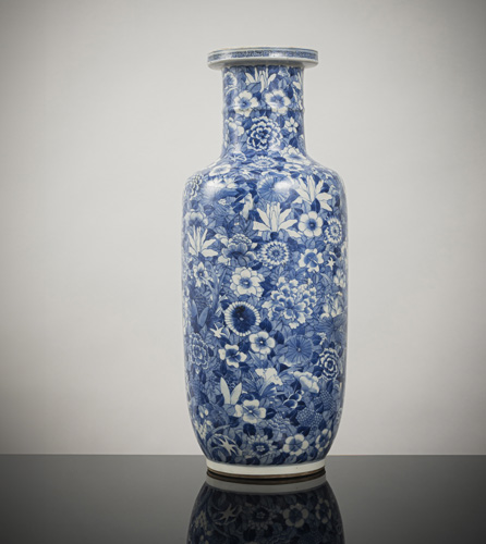 <b>A rare and fine porcelain 'Mille-Fleur' rouleau vase decorated in underglaze blue</b>