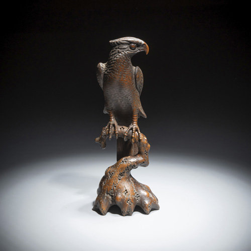 <b>A fine carved boxwood okimono of a falcon</b>