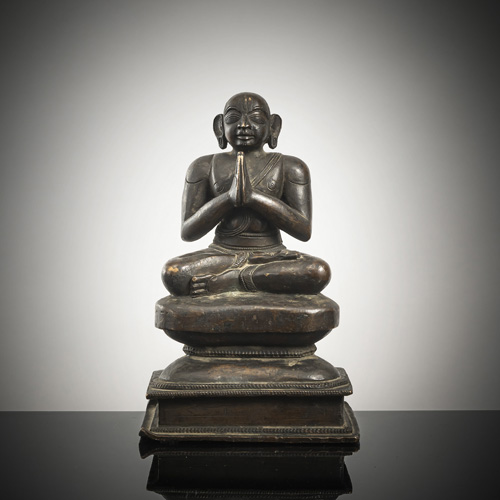 <b>A BRONZE FIGURE OF A SAINT</b>