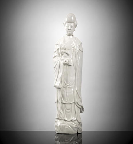 <b>A large Dehua figure of standing Guanyin with a boy</b>