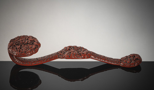 <b>A fine and rare cinnabar lacquer Ruyi sceptre</b>