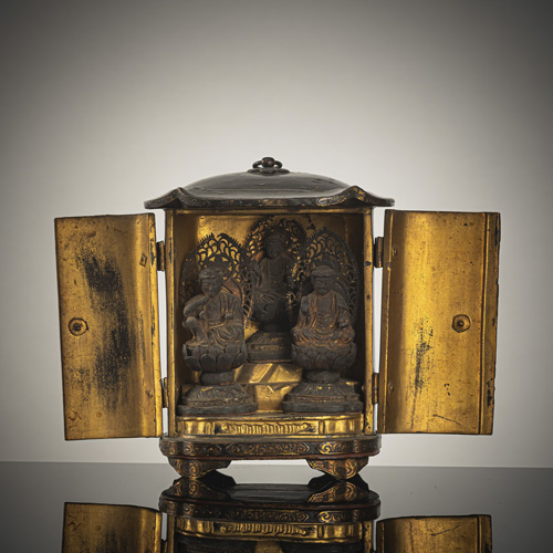<b>A lacquered wood travel altar depicting an Amida Buddha triad.</b>