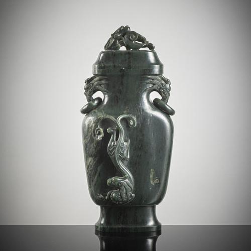 <b>A spinach-green jade 'chilong' relief vase and cover</b>