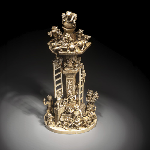 <b>A fine and rare carved ivory okimono with 31 oni on a lantern</b>