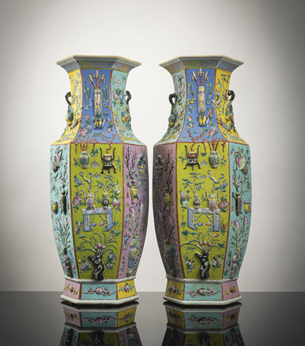 <b>A pair of hexagonal Peranakan / Nyonya straits 'famille rose' porcelain vases with peaches and antiquities in relief</b> <b>A pair of hexagonal Peranakan / Nyonya straits 'famille rose' porcelain vases with peaches and antiquities in relief</b>