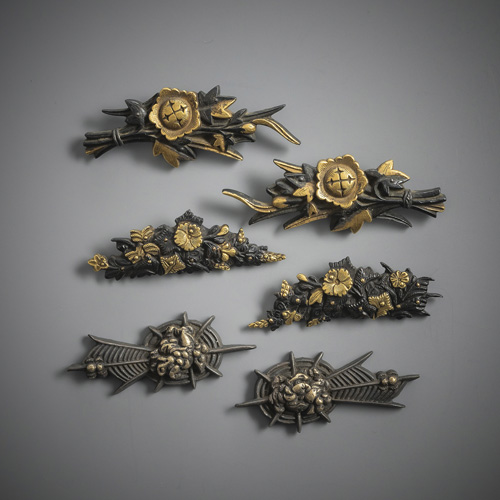 <b>Three pairs of shakudô menuki with gold details</b>