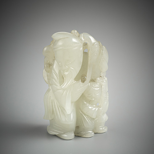 <b>A light green jade carving of an immortal with a servant boy</b>