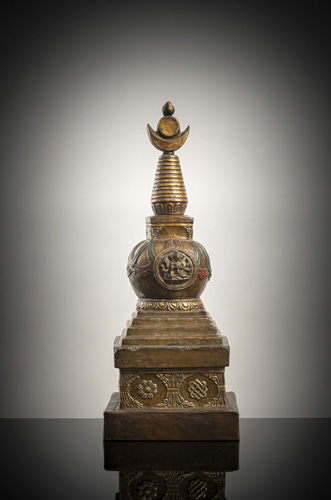 <b>A PARCEL EMBOSSED COPPER AND LACQUERED STUCCO STUPA</b>
