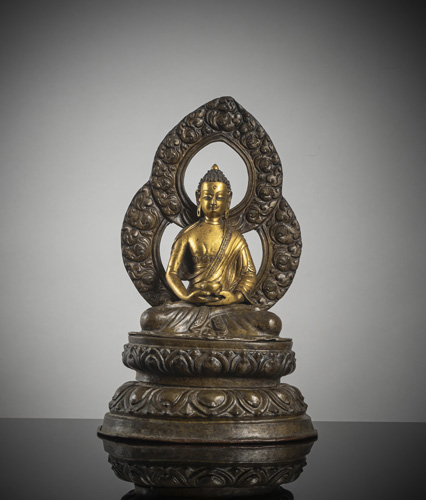 <b>A part-gilt copper repoussé figure of Buddha Shakyamuni</b>