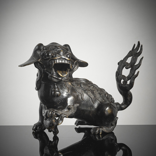 <b>A bronze figure of a seated fo-lion</b>