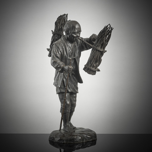 <b>A bronze okimono of a farmer carrying twig baskets</b>