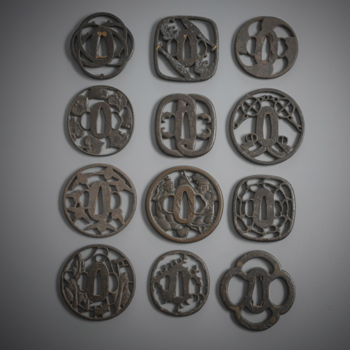 <b>A group of twelve sukashi tsuba made of iron</b>