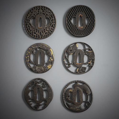 <b>A group of six sukashi tsuba made of iron, some with details in gold</b>