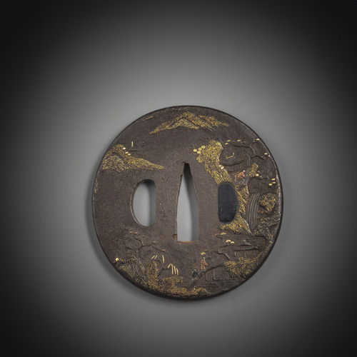<b>Iron tsuba with gold decoration</b>