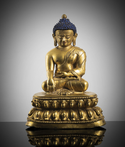 <b>A GILT-BRONZE FIGURE OF BUDDHA SHAKYAMUNI</b>