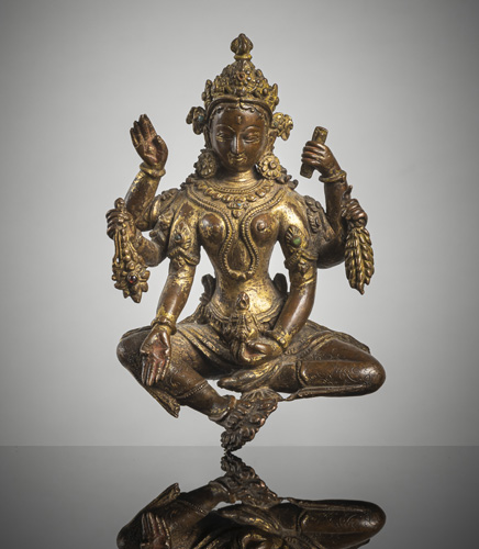 <b>A fine gilt-copper figure of Vasudhara</b>