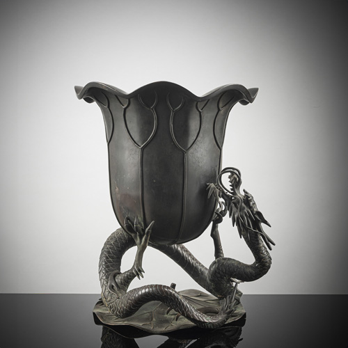 <b>A bronze cachepot in shape of a lotus leaf on a dragon stand</b>