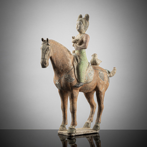<b>A polychrome-painted figure of a court lady with two birds riding a horse</b>