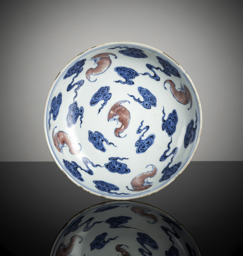 <b>A rare plate with bats and clouds in copper red and underglaze blue</b>