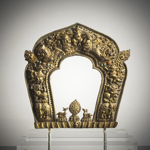 <b>A GILT-COPPER EMBOSSED ORNAMENT</b>