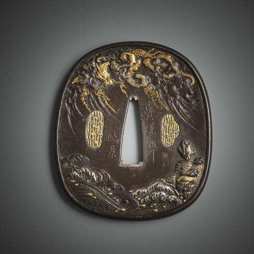 <b>An iron tsuba depicting mount fuji, a dragon and a tiger</b>