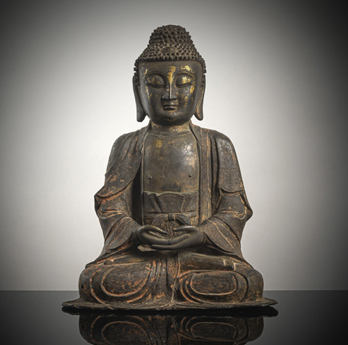 <b>A part-gilt bronze figure of Buddha Shakyamuni</b>