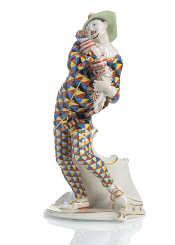 <b>A NYMPHENBURG FIGURE OF MEZZETINO FROM THE COMMEDIA DELL'ARTE</b> <b>A NYMPHENBURG FIGURE OF MEZZETINO FROM THE COMMEDIA DELL'ARTE</b>