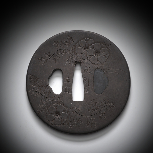 <b>Tsuba aus Eisen mit Kirschblüten</b> <b>Tsuba aus Eisen mit Kirschblüten</b>