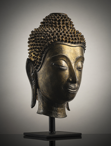 <b>VERGOLDETER UND SCHWARZ LACKIERTER BRONZEKOPF DES BUDDHA SHAKYAMUNI</b> <b>VERGOLDETER UND SCHWARZ LACKIERTER BRONZEKOPF DES BUDDHA SHAKYAMUNI</b>