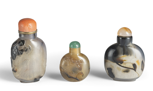 <b>Three snuff bottles, agate, partly with relief decoration</b>