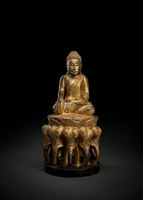 <b>A GILT- AND BLACK-LAQUERED WOOD FIGURE OF BUDDHA SHAKYAMUNI</b>