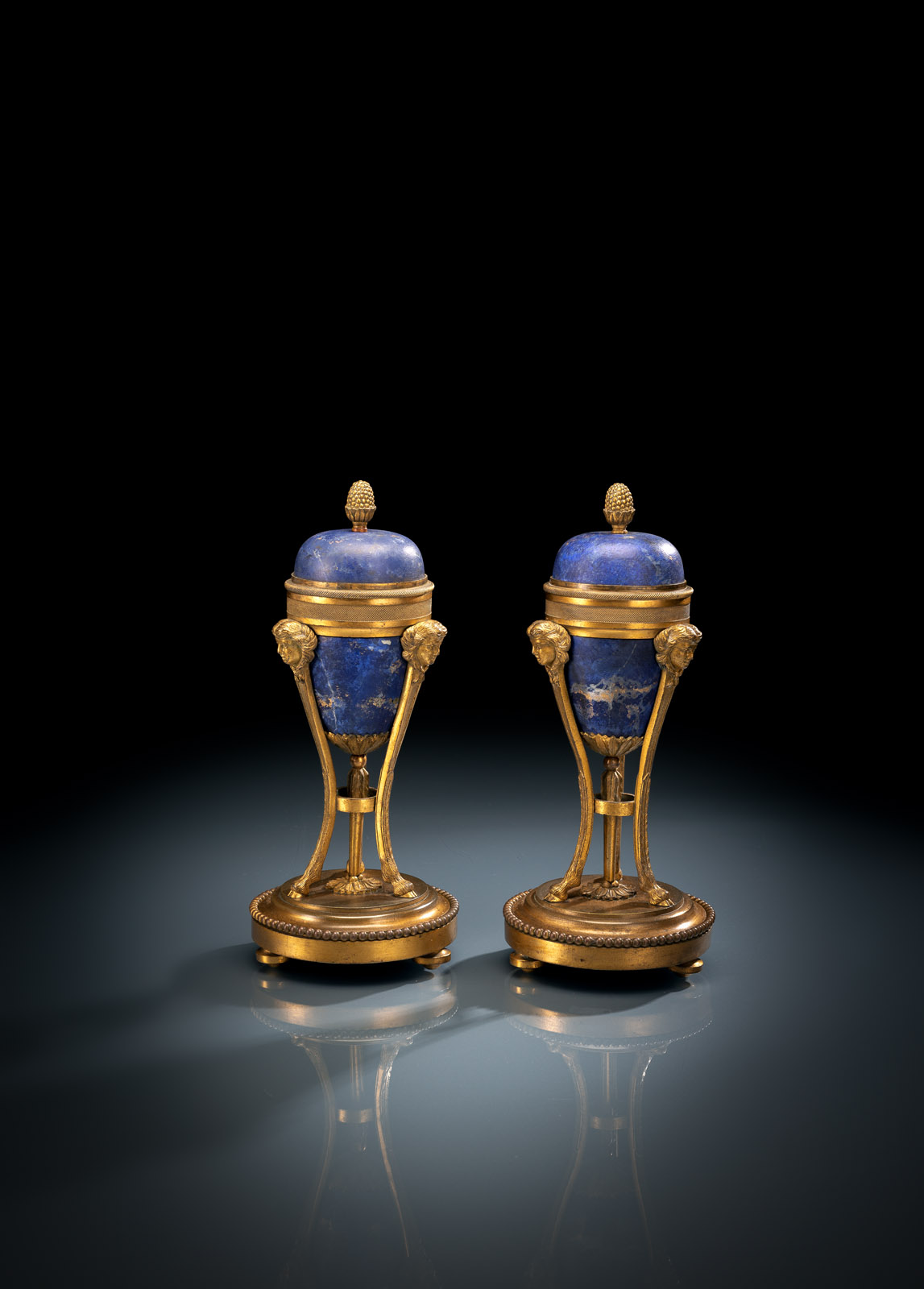 <b>A PAIR OF FRENCH EMPIRE LAIPS-LAZULI PATTERN GILT BRONZE CASSOLETTES</b>