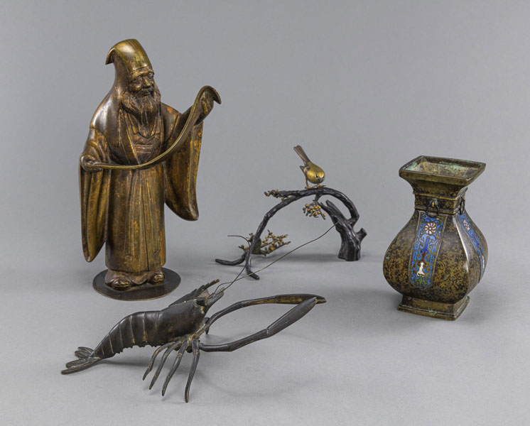 <b>A FIGURE OF JURÔJIN, A LOBSTER, A MODEL OF A BIRD PERCHED ON A FLORAL SPRAY AND A VASE PARTLY INLAID WITH CLOISONNÉ ENAMEL</b>