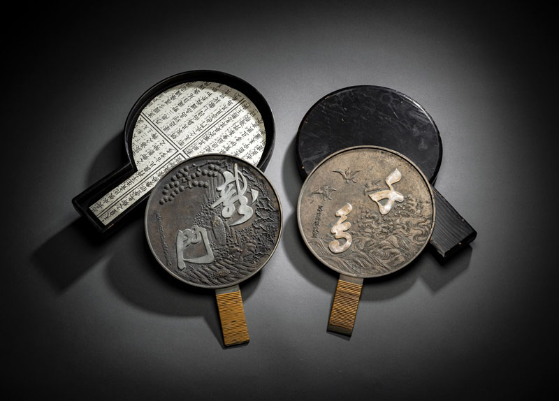 <b>TWO HAND MIRRORS DECORATED WITH A CARP AND CHIDORI IN BLACK-LACQUERED FITTED BOXES</b>