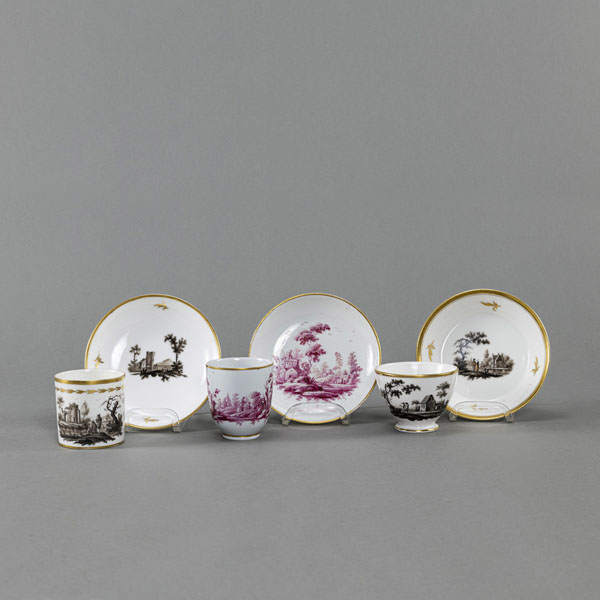 <b>THREE CUPS AND SAUCERS WITH LANDSCAPE PATTERN</b>