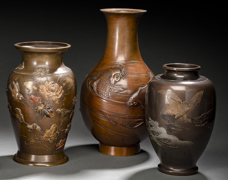 <b>THREE BRONZE VASES AMONG OTHERS DECORATED WITH SPARROWS, AN EAGLE AND CARPS</b>