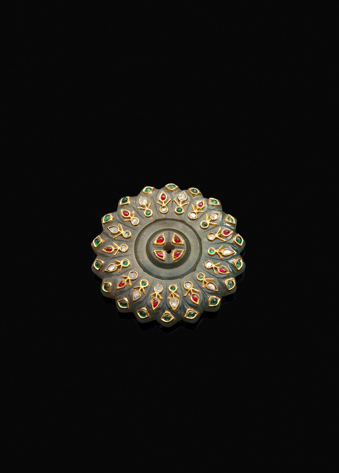 <b>A MOVABLE BLOSSOM-SHAPED MUGHAL STYLE JADE CARVING WITH INLAIYS IN GOLD, DIAMONDS AND RUBIES NEAR EMERALDS</b>