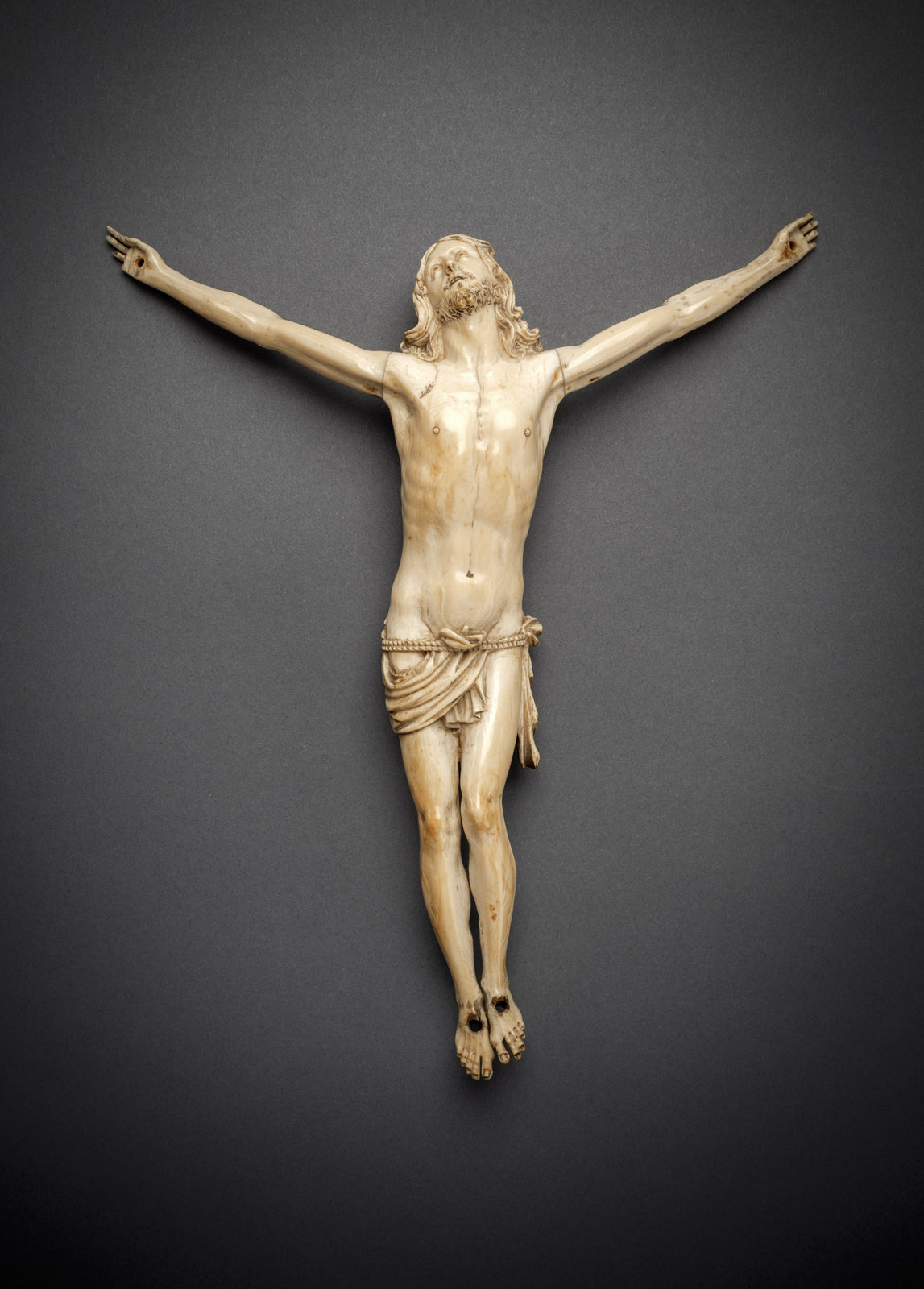 <b>A CARVED IVORY BODY OF CHRIST</b>